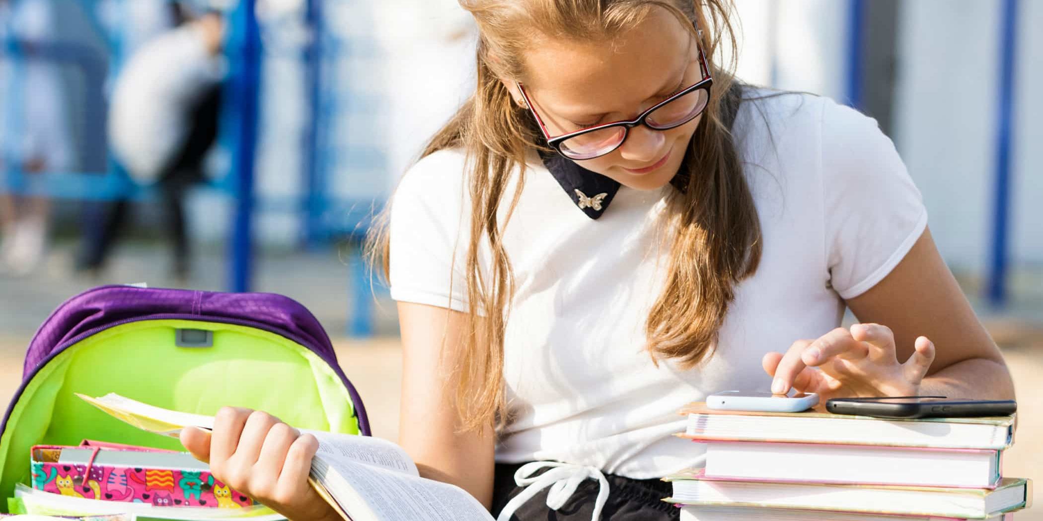 Portrait,Of,A,Schoolgirl,With,Glasses,On,The,Street