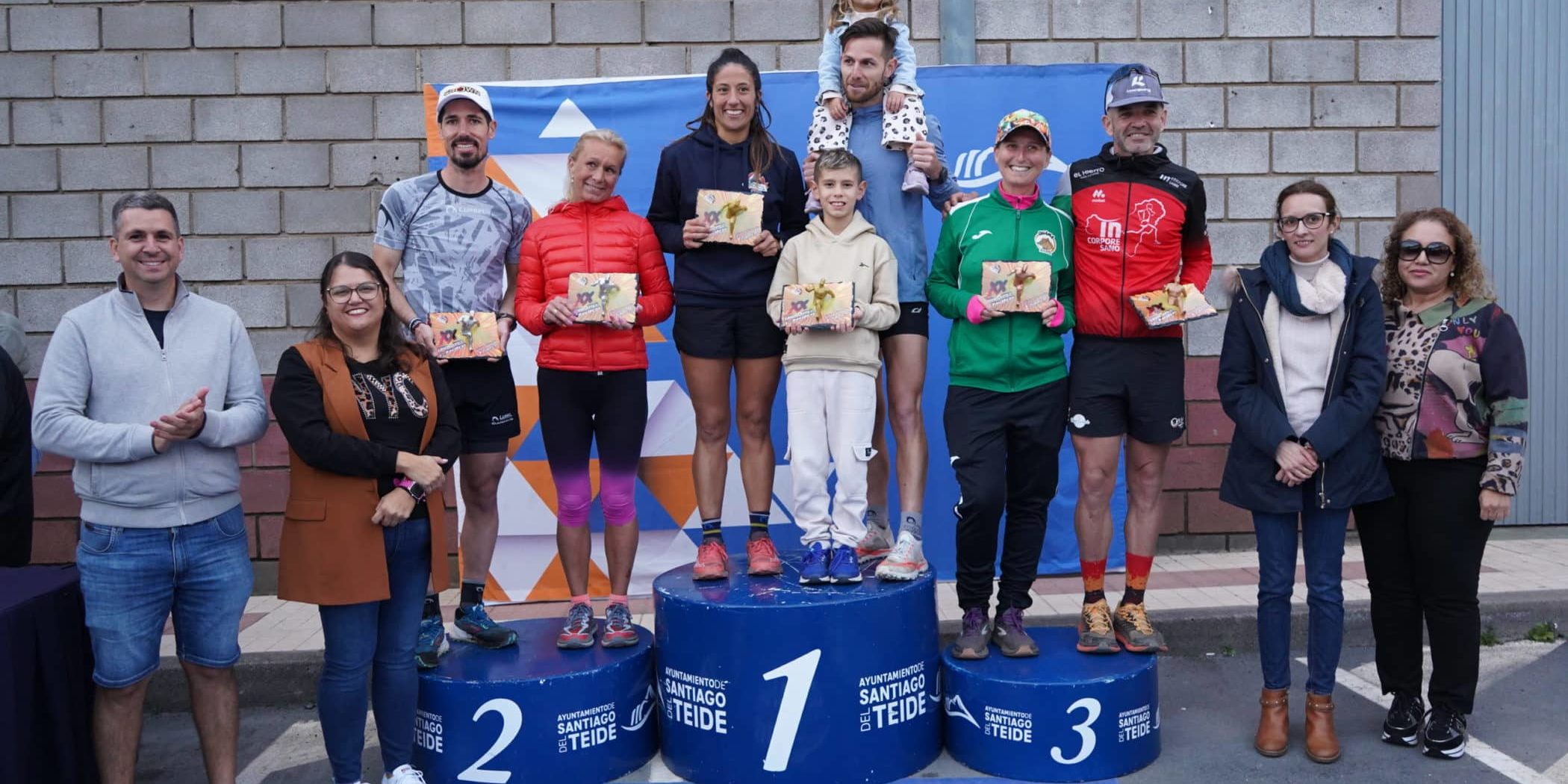 Podium general masculino y femenino
